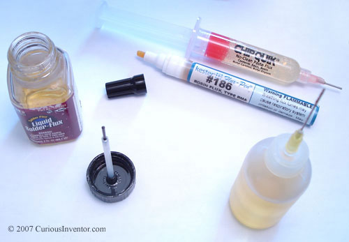 Flux applicators: needle bottle, paste syringe, flux pen, and brush